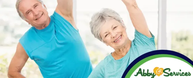 Two fit and happy seniors exercising