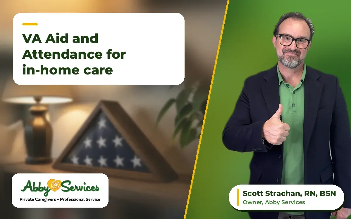 Scott Strachan, RN, BSN, owner of Abby Services, giving a thumbs up, with a folded American flag in a display case on a shelf in the background