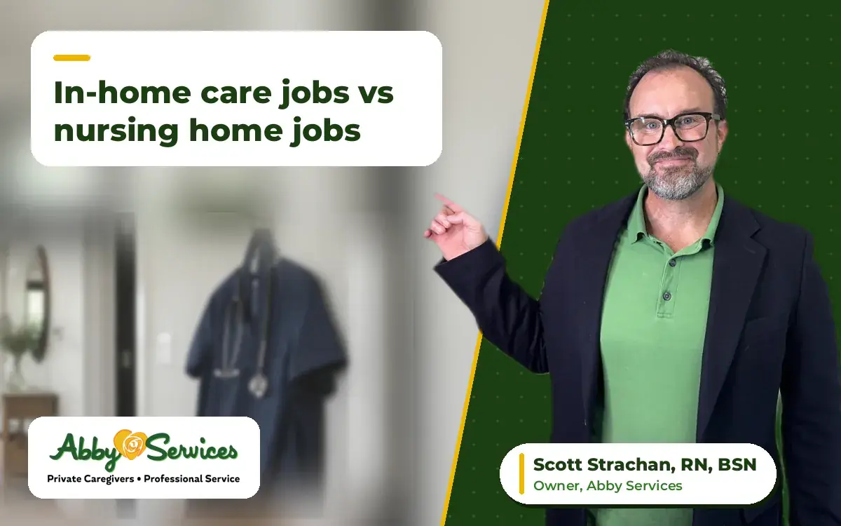 Scott Strachan, RN, BSN, owner of Abby Services, pointing to the article title, with scrubs and a stethoscope hanging in a home entryway in the background