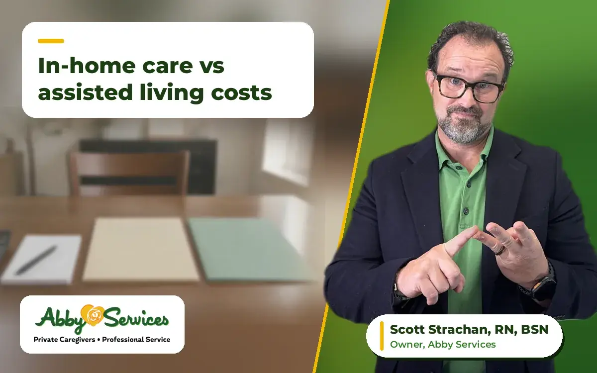 Scott Strachan, RN, BSN, owner of Abby Services, counting on his fingers, with a calculator, notepad and two folders on a dining table in the background