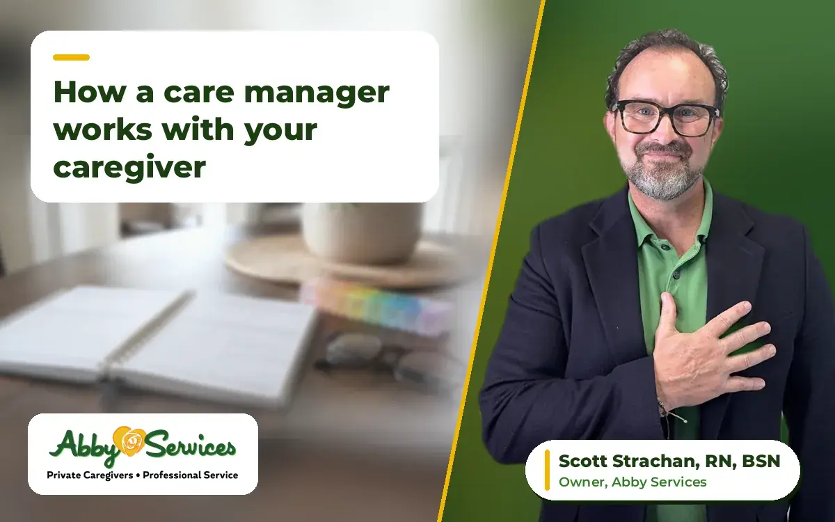 Scott Strachan, RN, BSN, owner of Abby Services, with his hand on his heart, with a weekly planner, pill organizer and reading glasses on a table in the background