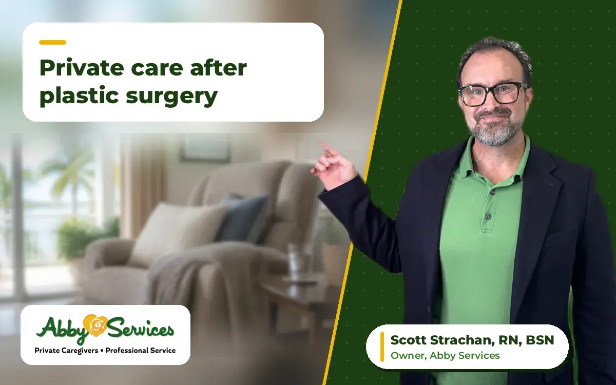 Scott Strachan, RN, BSN, owner of Abby Services, pointing to the article title, with a recliner with pillows and a throw blanket in a bright living room in the background