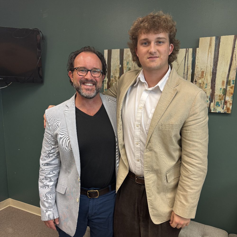 Scott Strachan, RN, BSN, and his son Tate Strachan at the Abby Services office