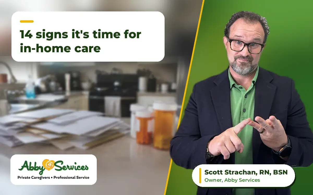Scott Strachan, RN, BSN, owner of Abby Services, counting on his fingers, with unopened mail and medicine bottles on a kitchen counter in the background